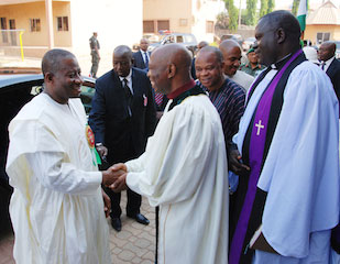 Jonathan at the Church of Christ In Nationss Abuja. Welcoming him is REV. DACHOLLOM DATIRI 