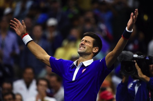 Novak Djokovic celebrates after defeating Roger Federer at the US Open final at Arthur Ashe Stadium in New York on September 13, 2015 (AFP Photo/Jewel Samad)
