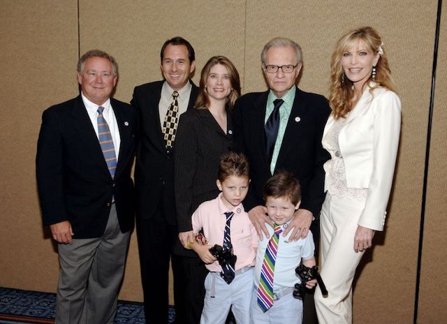 Larry King, 2nd right, with the 2 adult children he lost, 1st and 2nd left